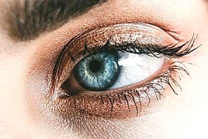 Close-up of an eye with full, soft lash extensions